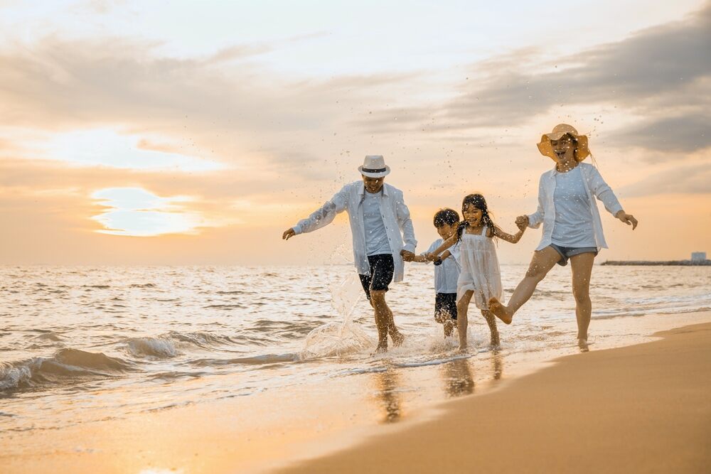 A family enjoying a getaway in Pattaya with their kids.